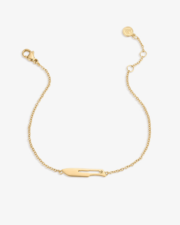 Gold bracelet with a unique 10 Blade pendant on a white background