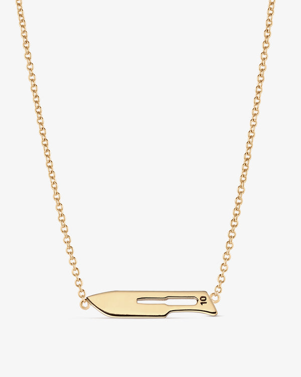 Gold necklace with a unique 10 Blade pendant on a white background