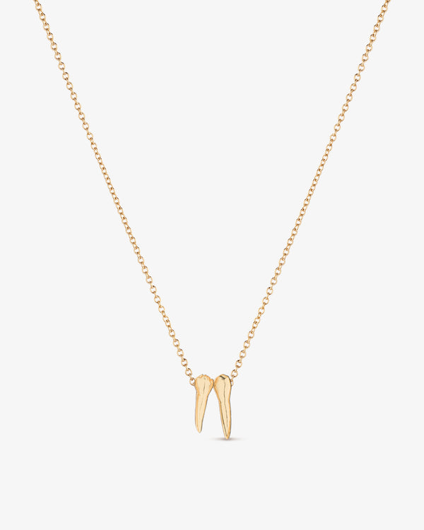 Gold necklace with tooth charm pendants spelling out graduation year 2027