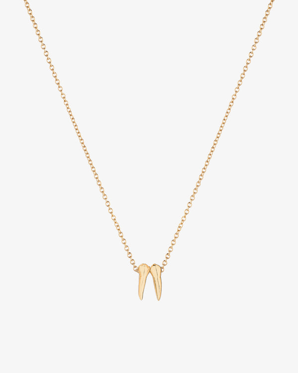 Gold necklace with tooth charm pendants spelling out graduation year 2028