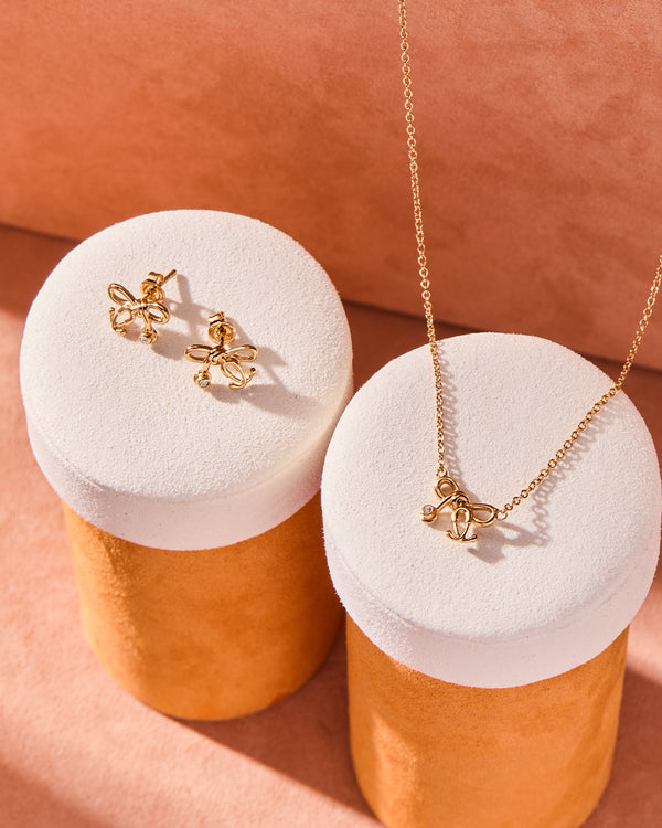 Tiny Stethoscope Bow Stud Earrings