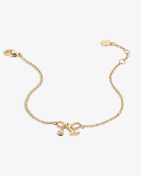 Tiny Stethoscope Bow Bracelet